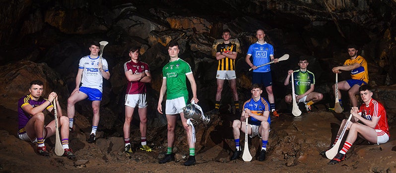 10 hurlers standing in a cave
