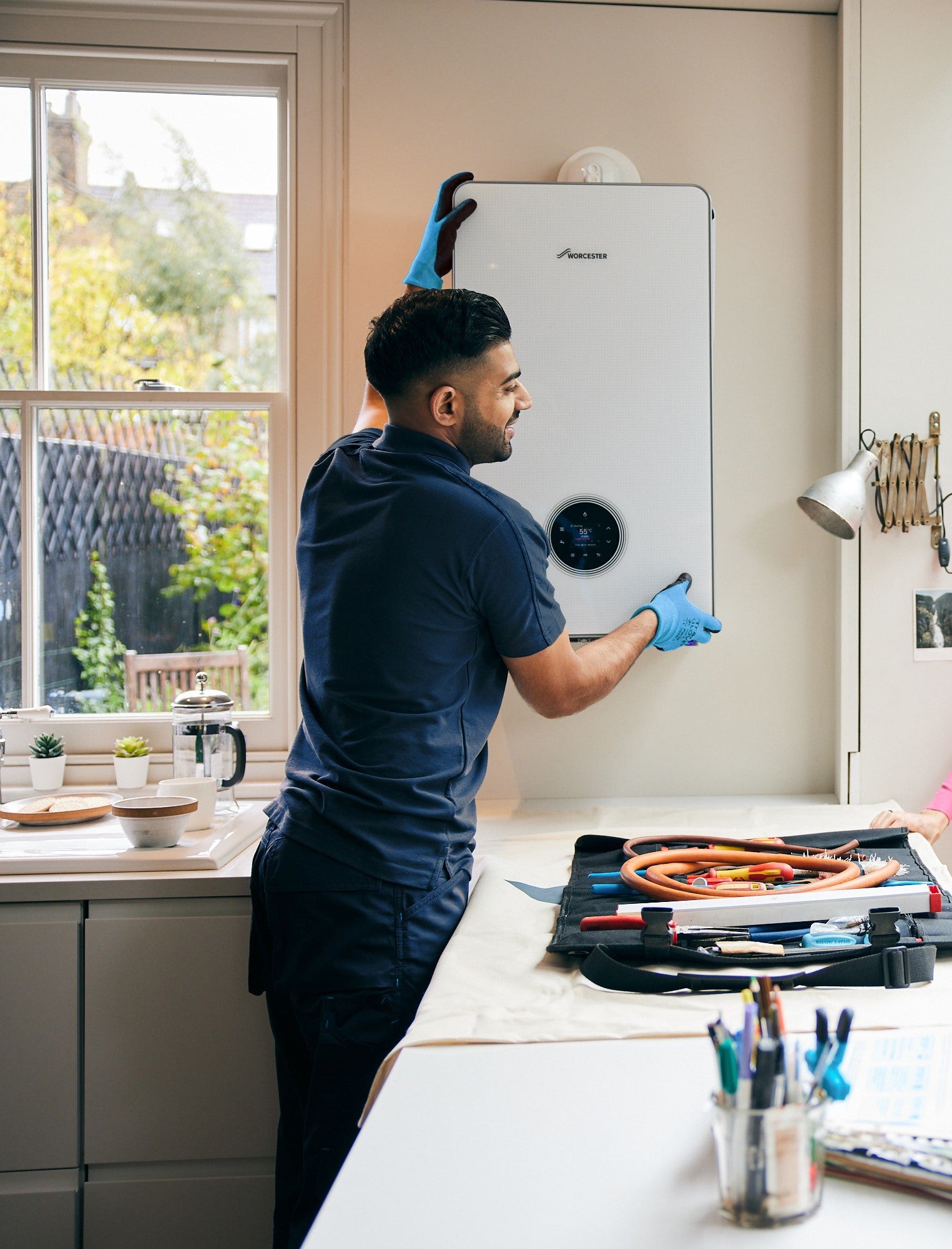 Man installing boiler