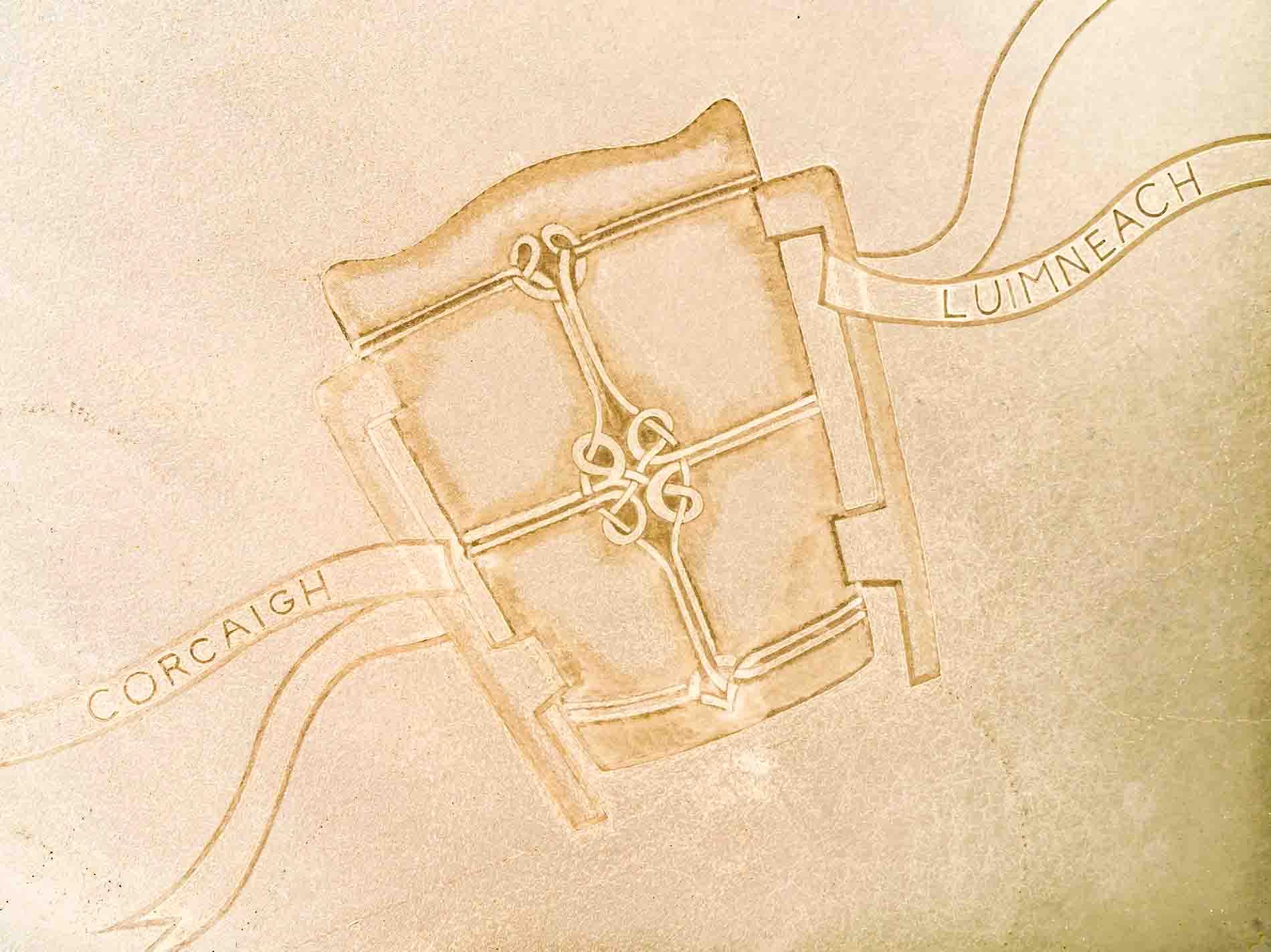 A photo of a massive Liam MacCarthy Cup carved into the sand on Sandymount beach.