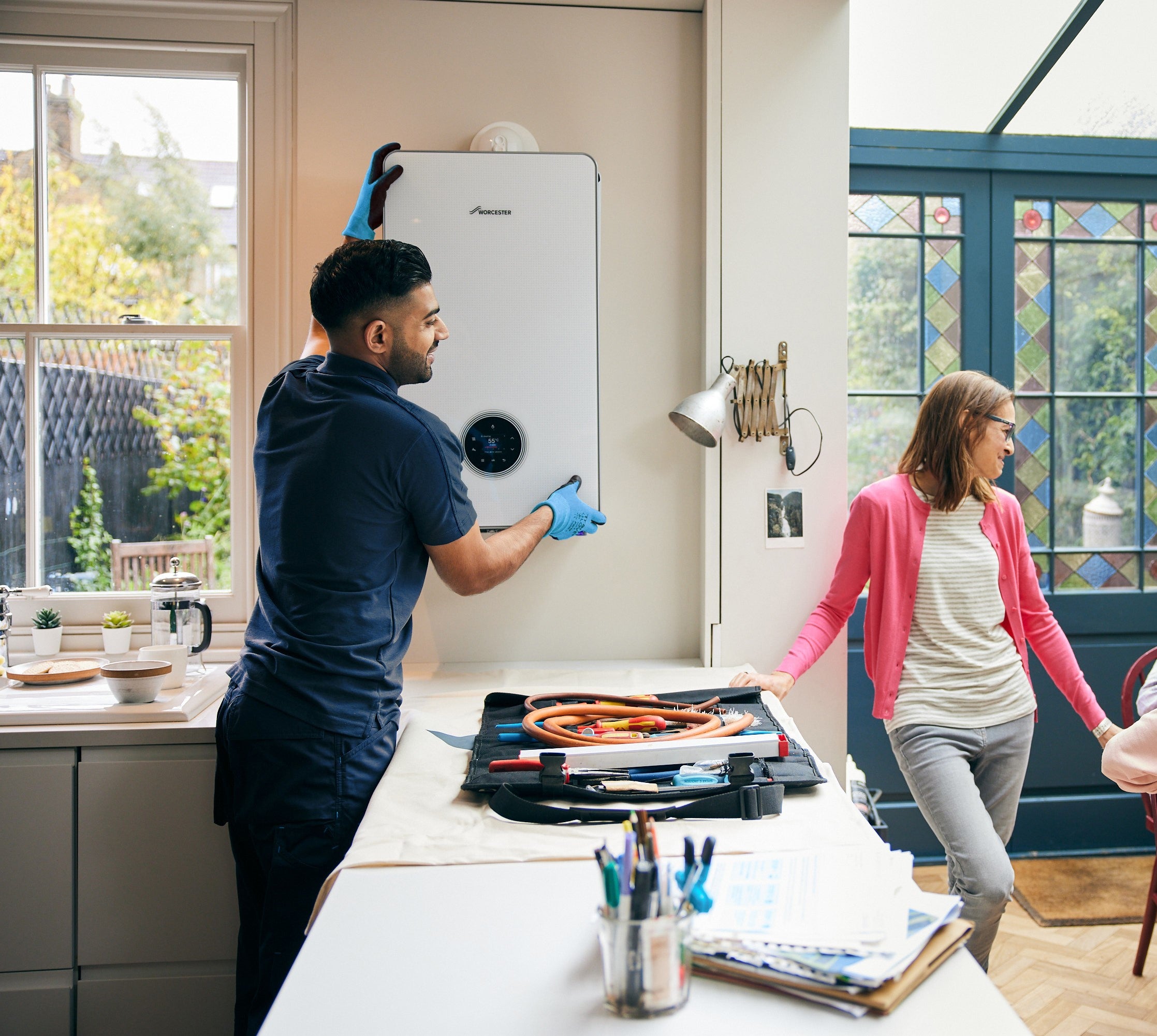 Engineer installing a boiler