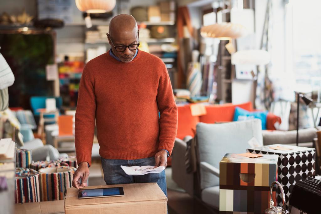 Man using tablet in workshop