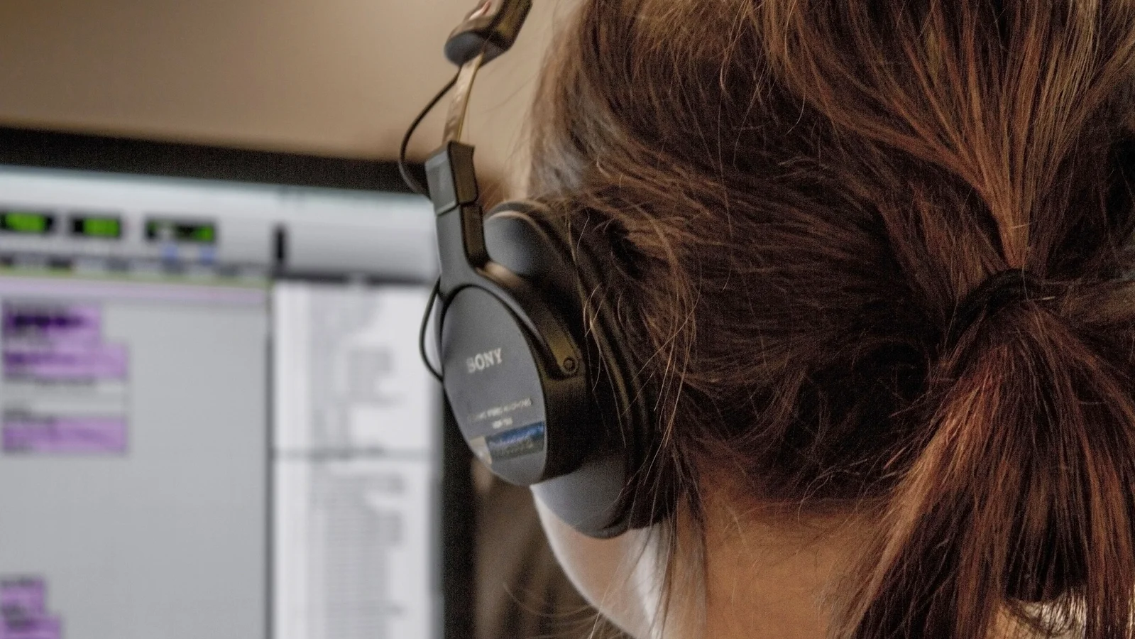 Developer wearing headphones