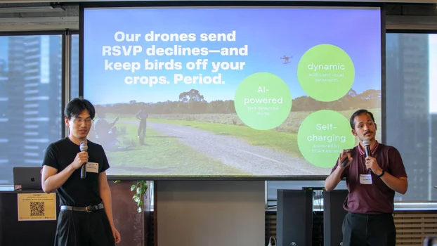 Picture of Animesh presenting at a conference