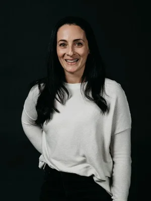 Picture of Dani Ryder against a black background 