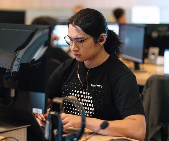 man focus working on computer