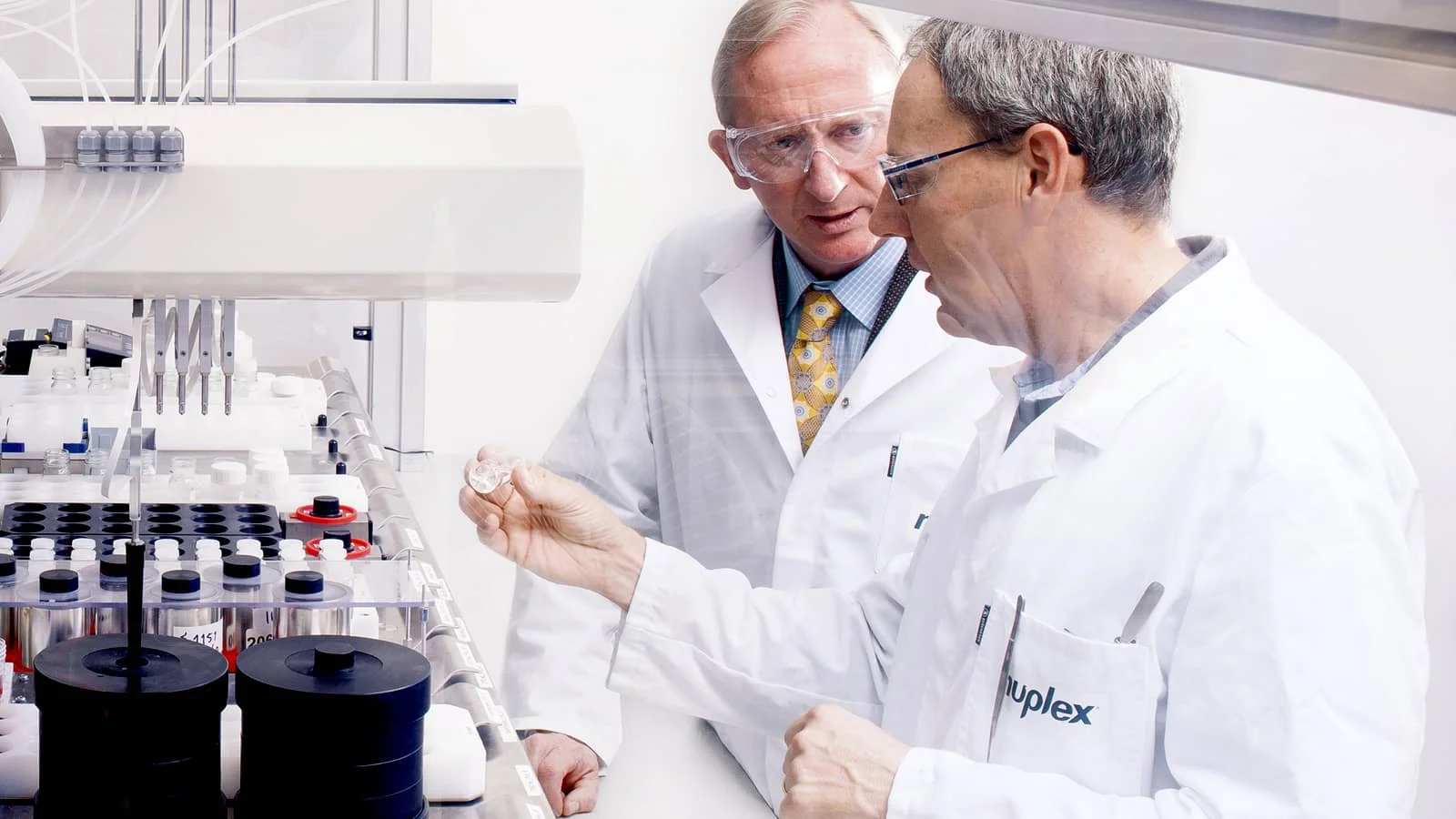 Two men in lab coats