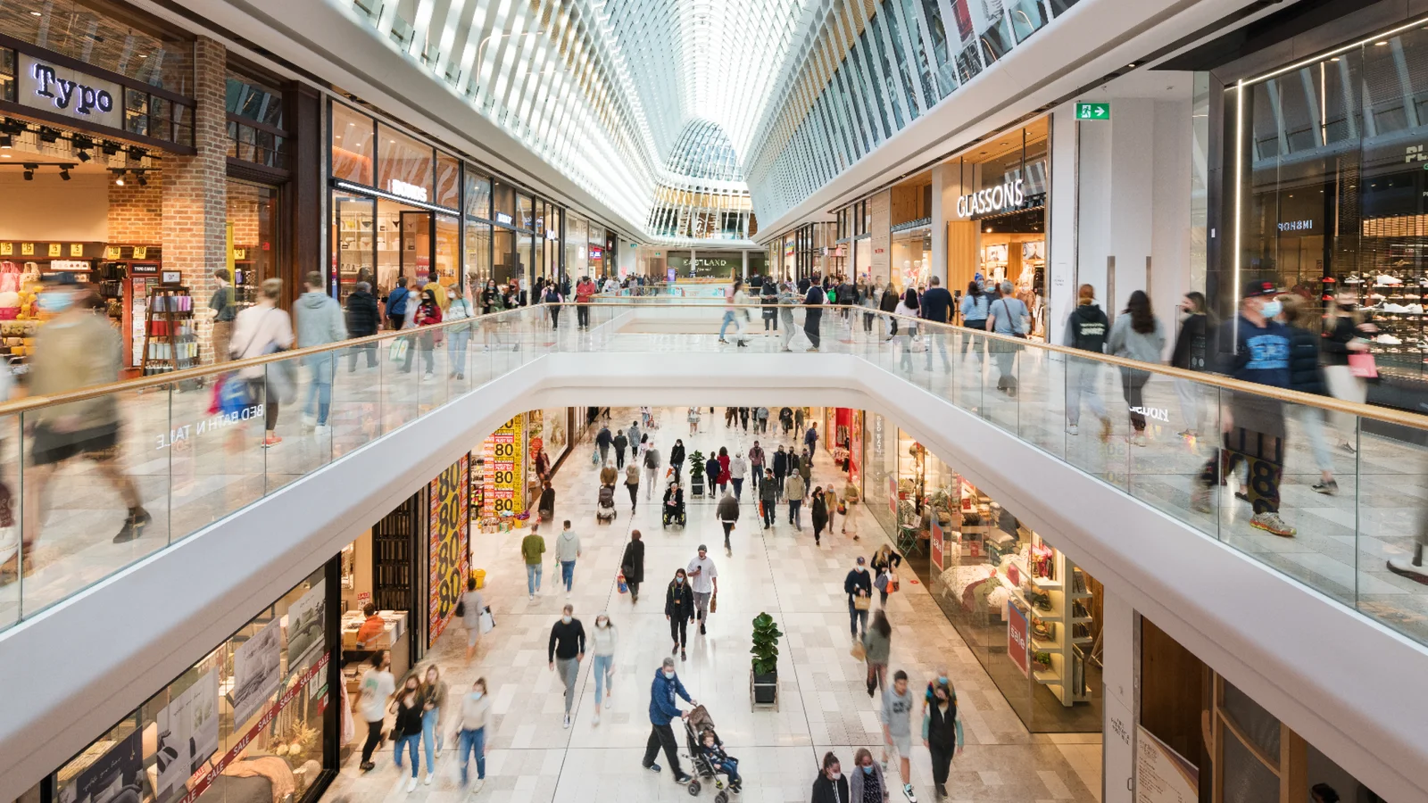 Shopping centre with people blurred