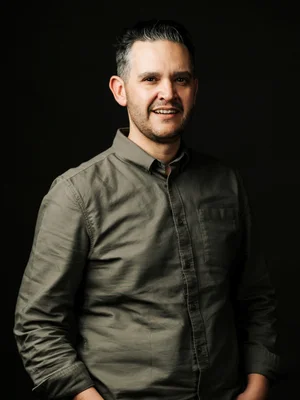 Picture of Andrew Radburnd against a black background