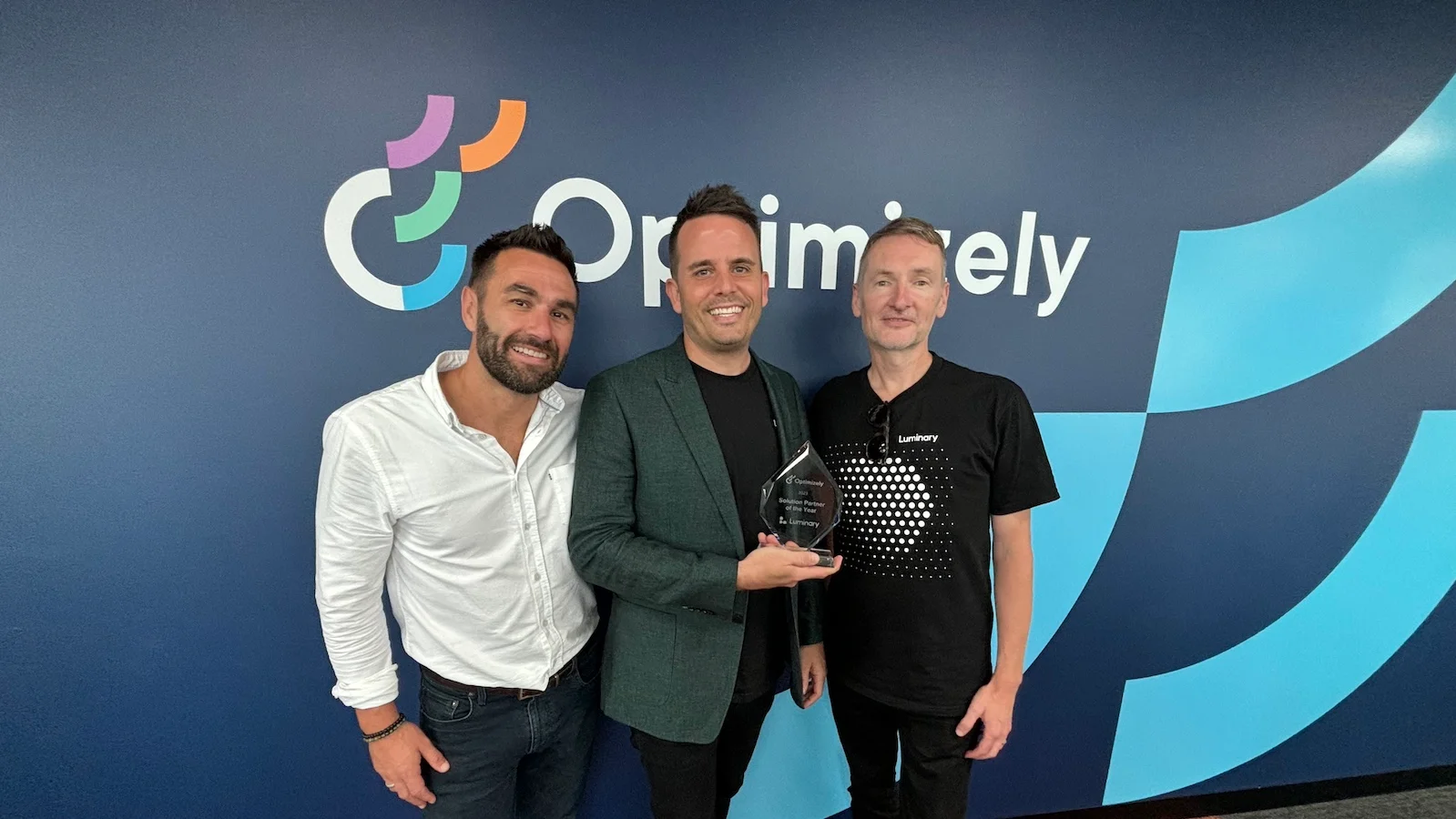 Luminary receiving Opti award