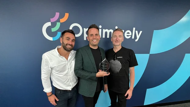 Luminary receiving Opti award