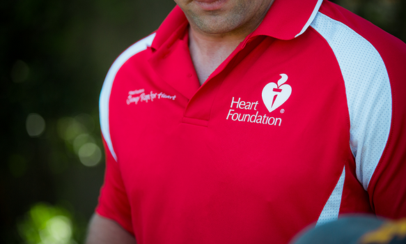 Man in Heart Foundation shirt