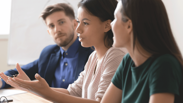 Three people talking