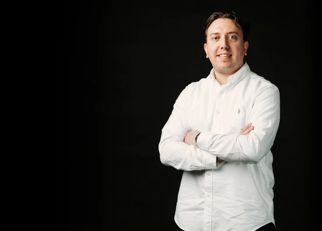 Picture of Lewis Pola against a black background