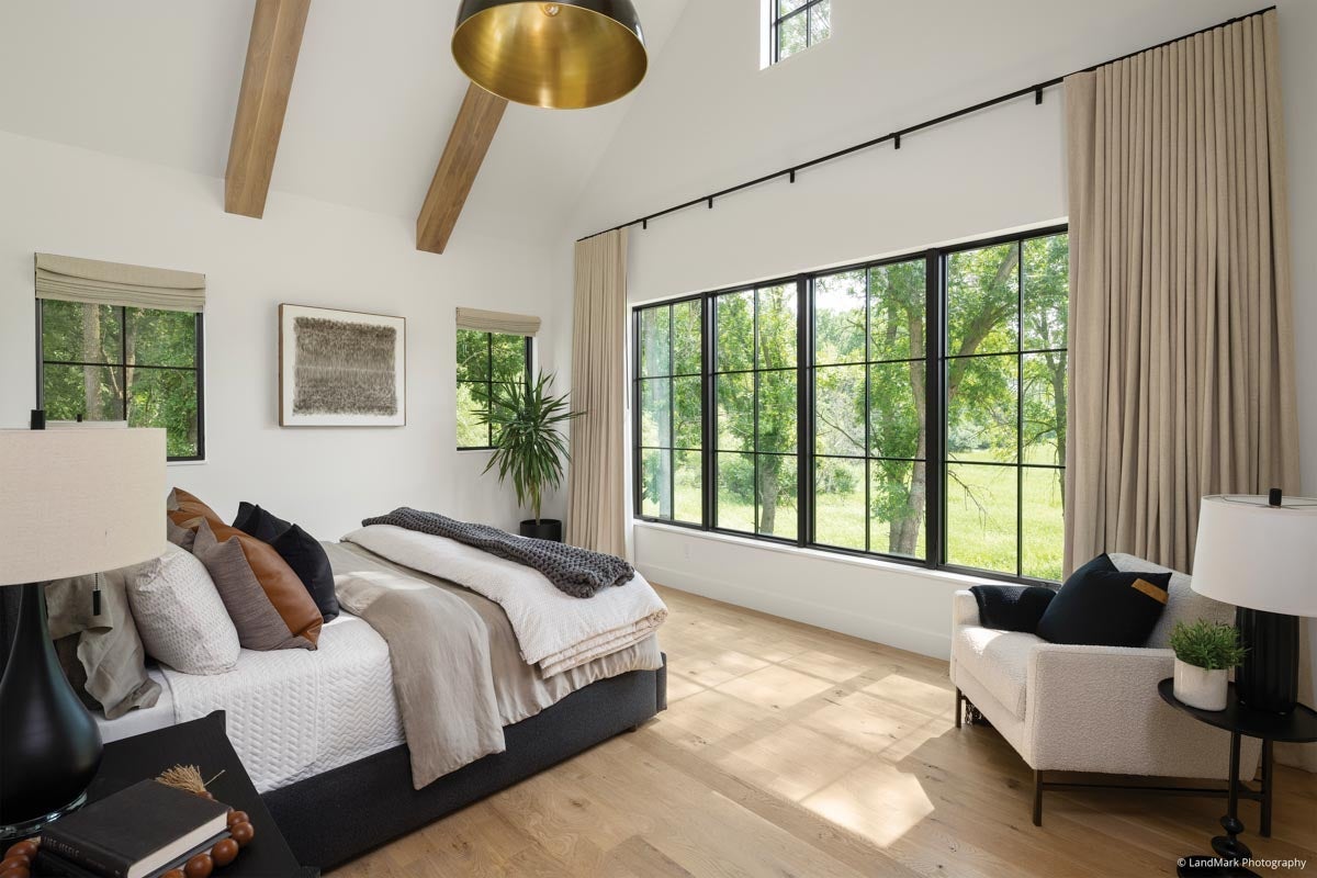 AN326 - bedroom with tall ceiling, wood beams and VistaLuxe Collection windows