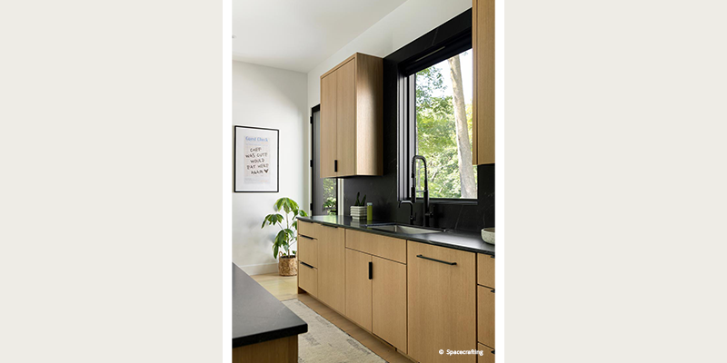 Large forgent kitchen window in front of sink