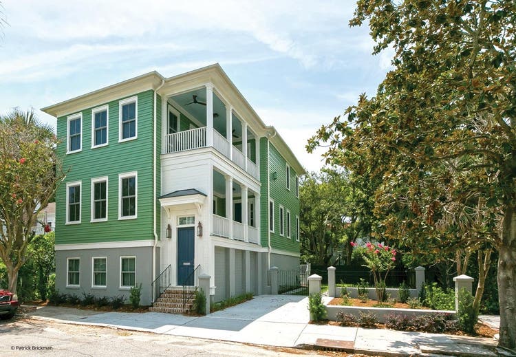 on the left: white large double hung windows