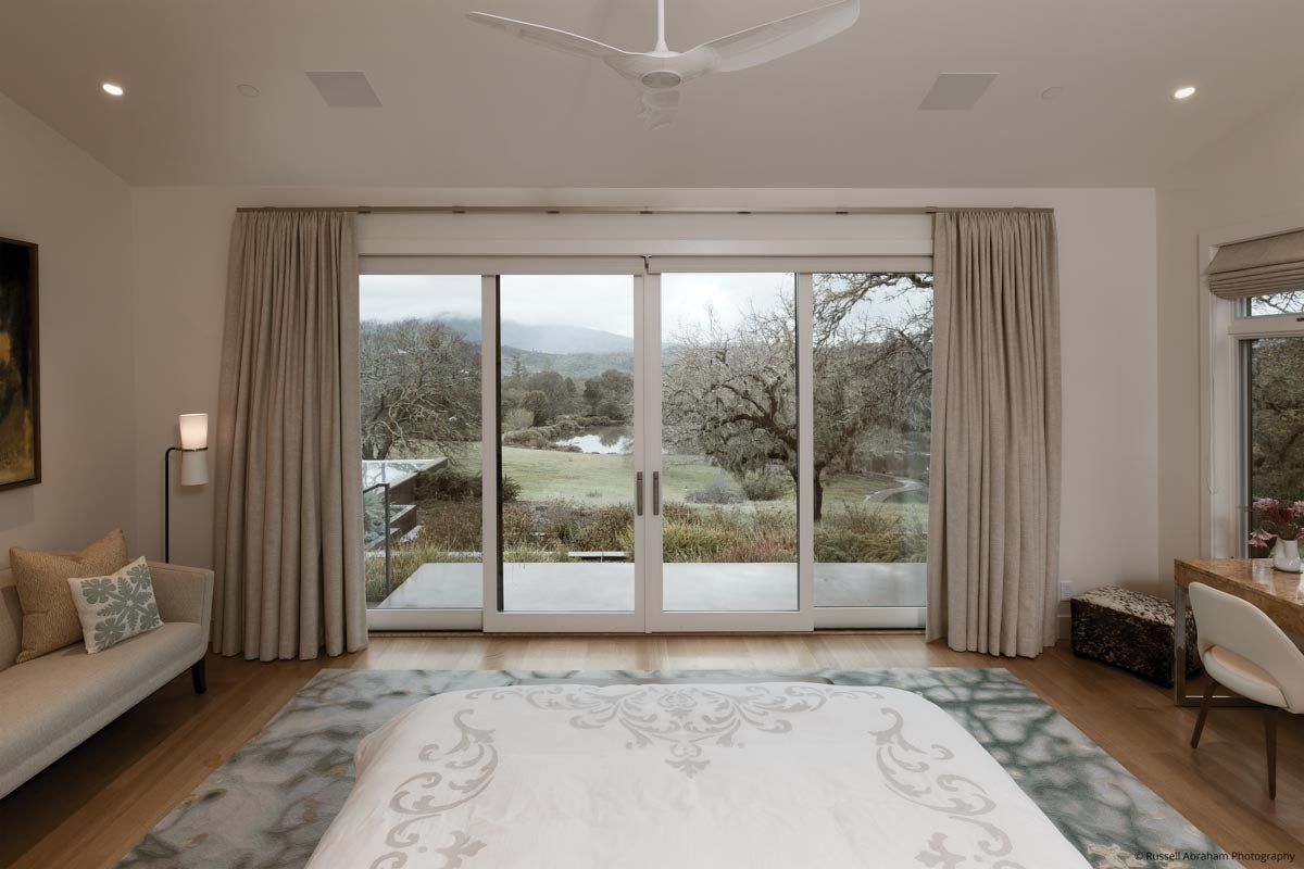 AM224 - Kolbe VistaLuxe WD sliding patio door featured in main bedroom