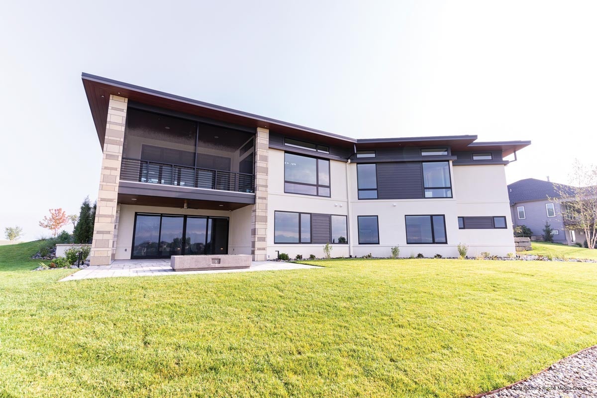 AM405 - back of house with Ultra series sliding door and multiple Forgent series windows