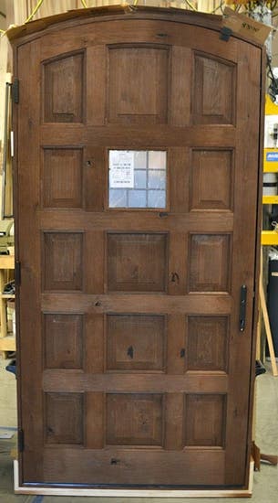 Radius-Top Knotty Alder Door with Wire-Brushed Finish