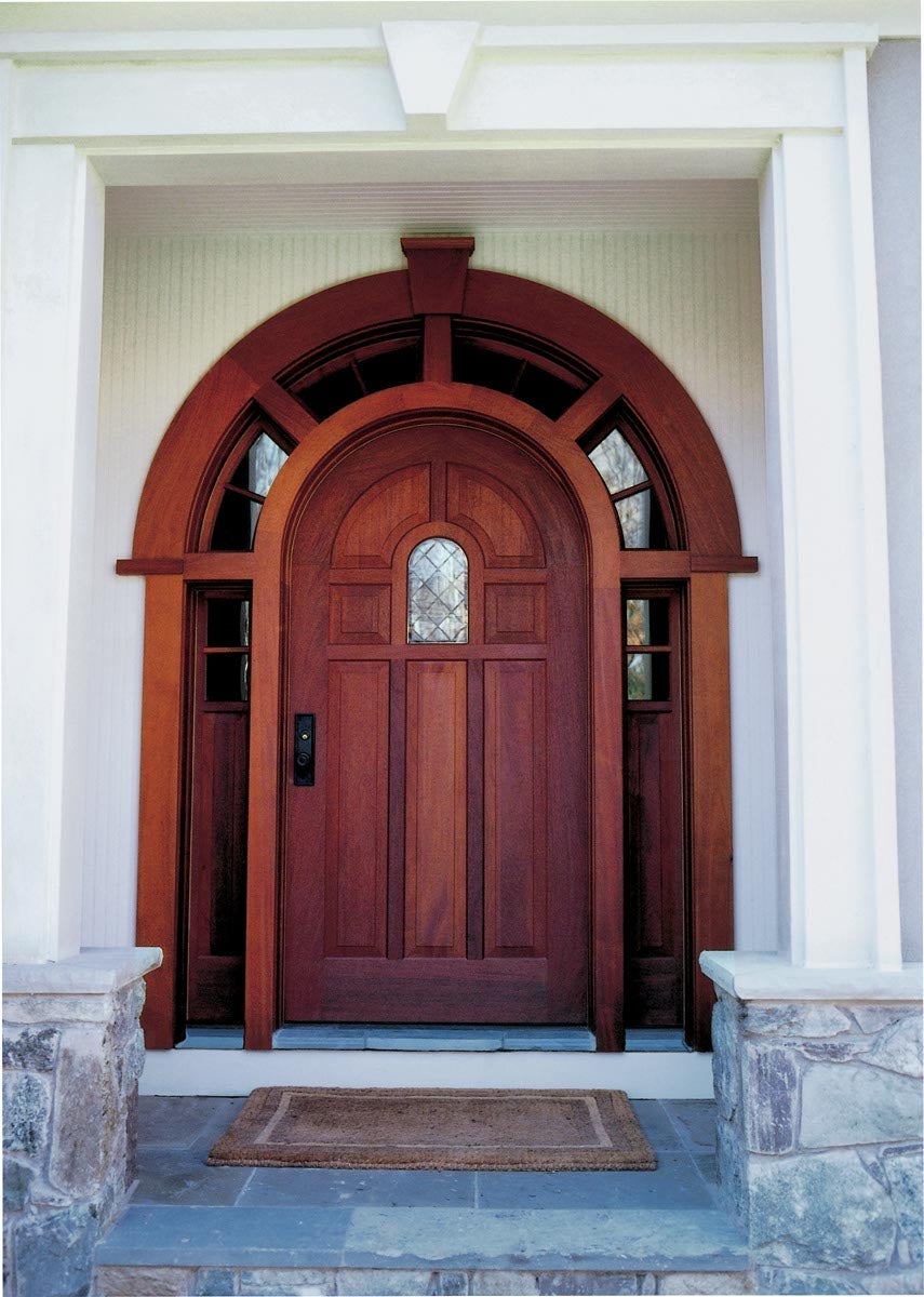 Heritage Series radius inswing entrance door with sidelites and a radius transom