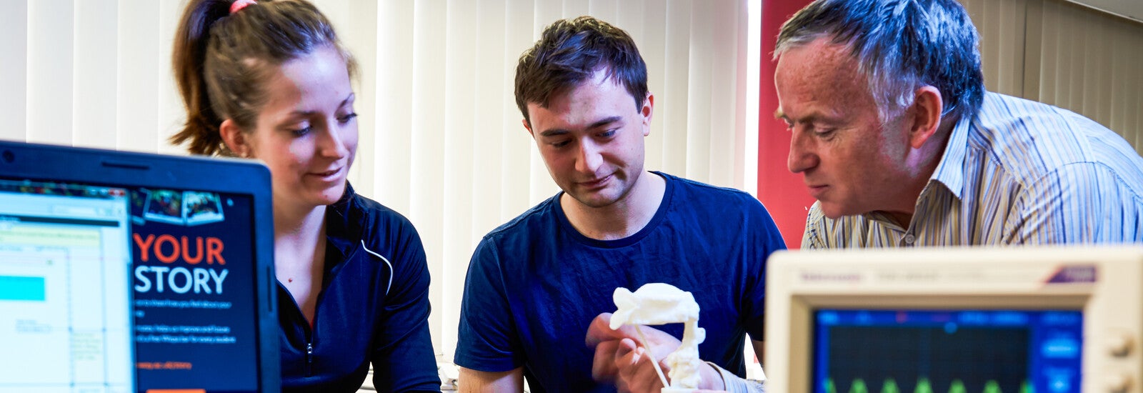 Engineering students with their teacher