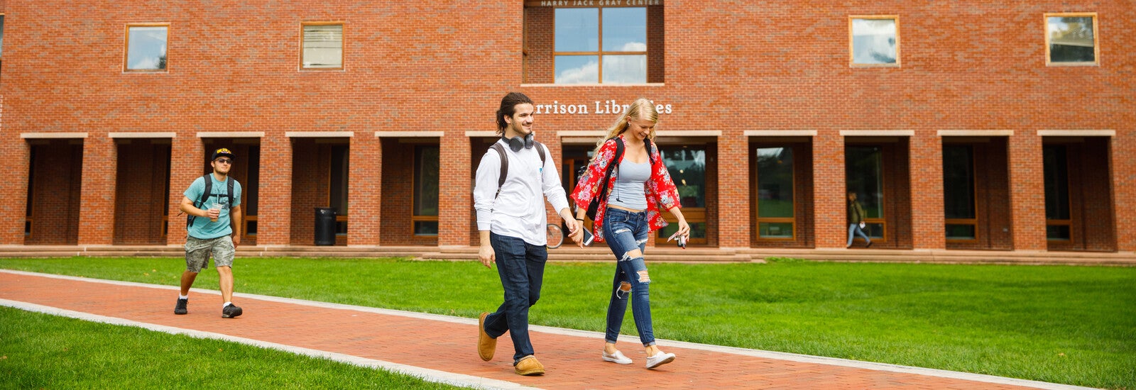 Students walking outside campus building