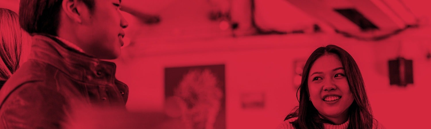 Sussex students smiling in class