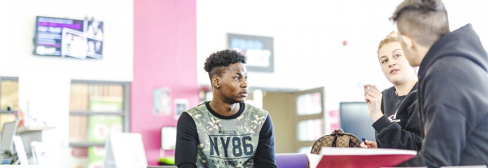 Students studying together in study room
