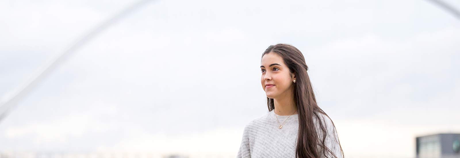 Durham graduates smiling at camera
