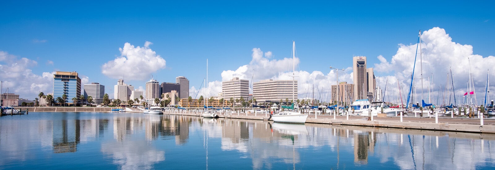 A city skyline reflected in water in Texas