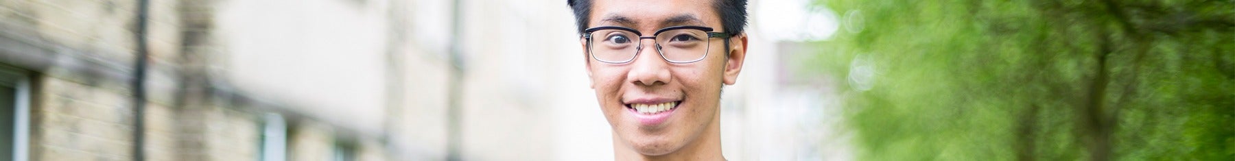 Student smiling at camera