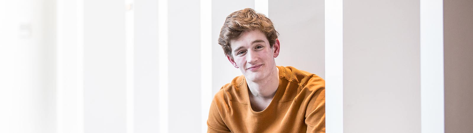 Student smiling at camera