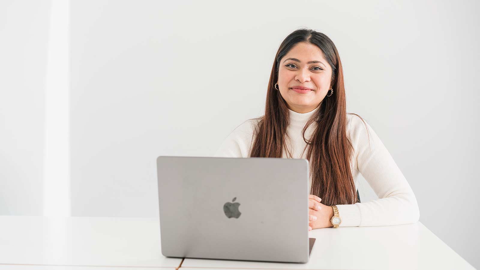 A University of Huddersfield London student on their laptop