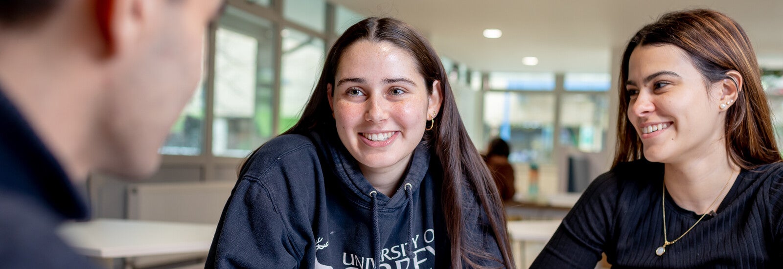 Surrey student smiling on campus