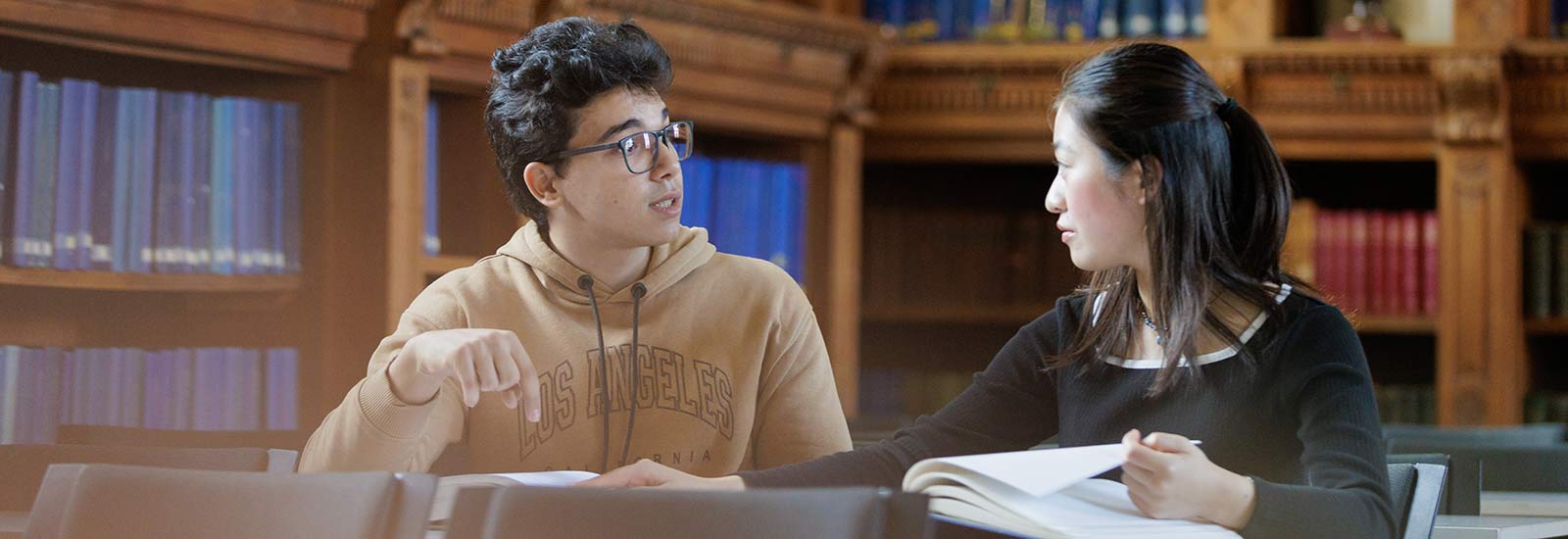 Royal Holloway University London students in a library