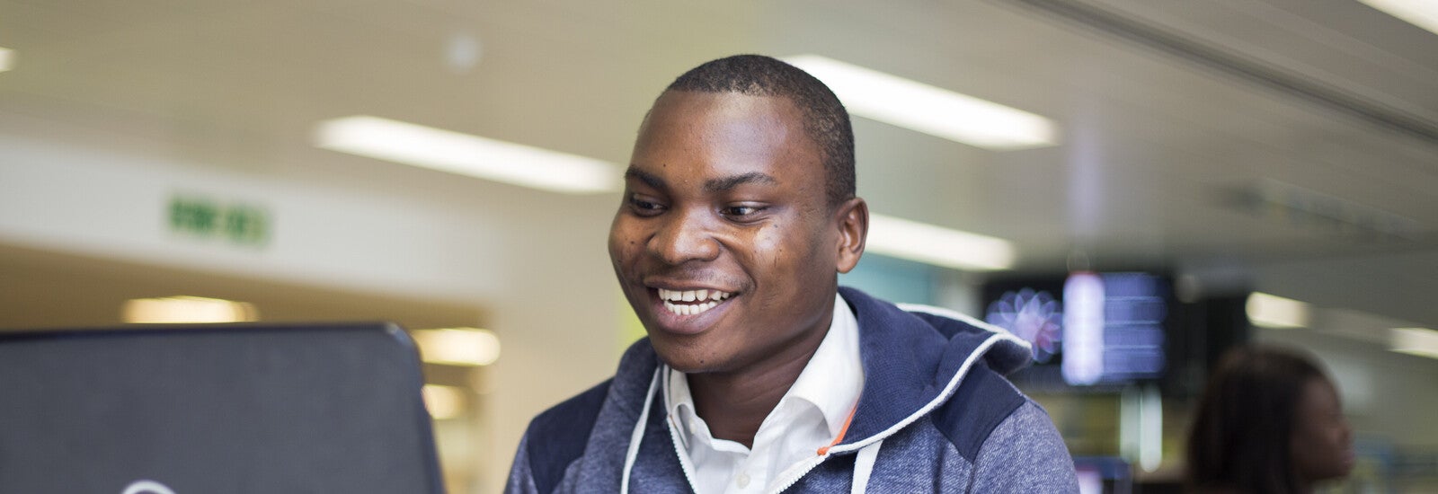 Kingston ISC student in front of a laptop