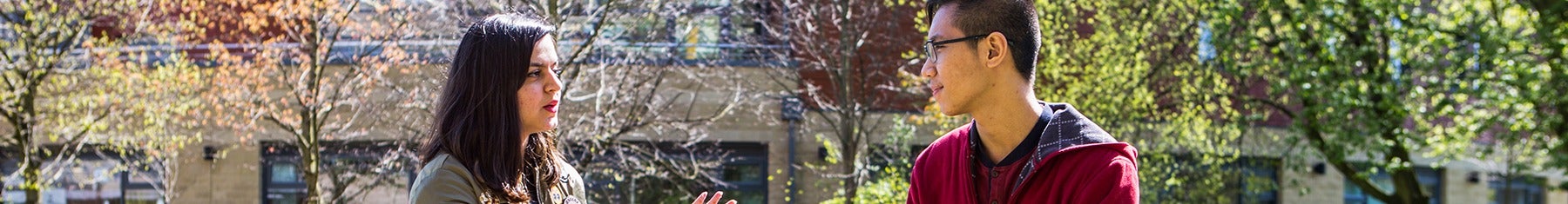 Students talking outside campus