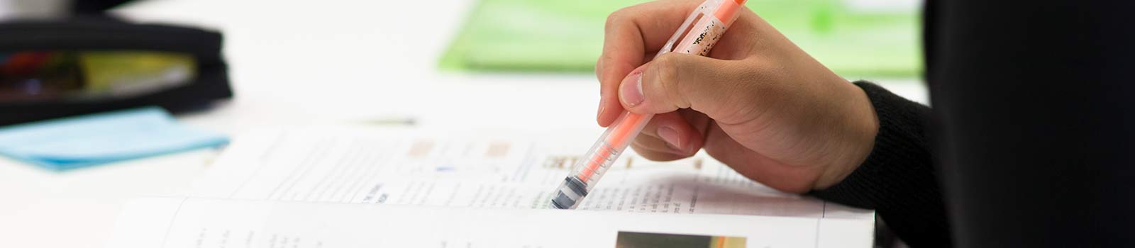 A student working out of a book