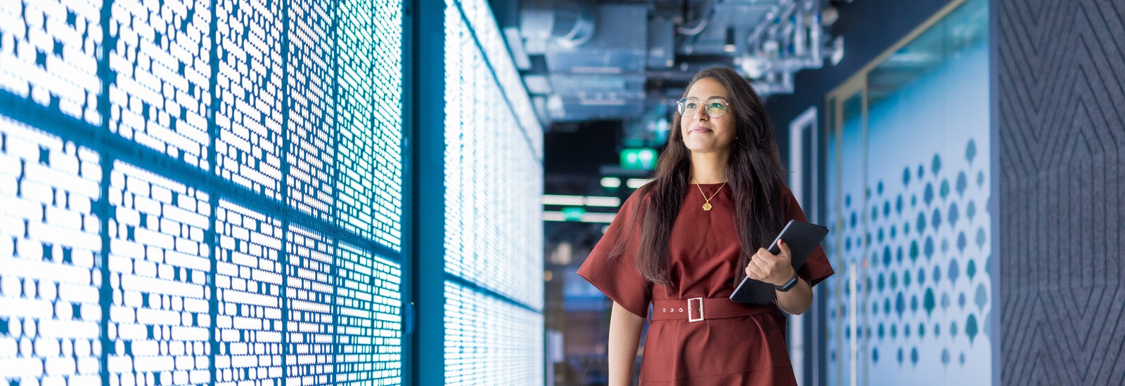 A student walking through a university campus