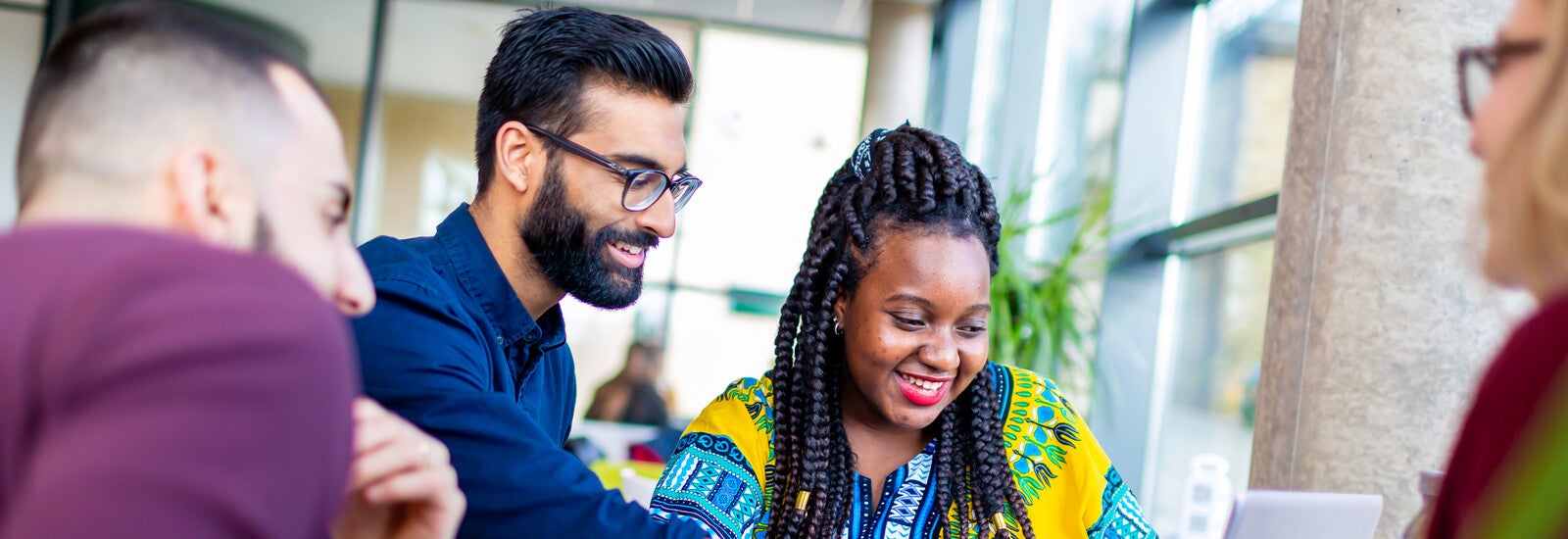Students working together in the common area