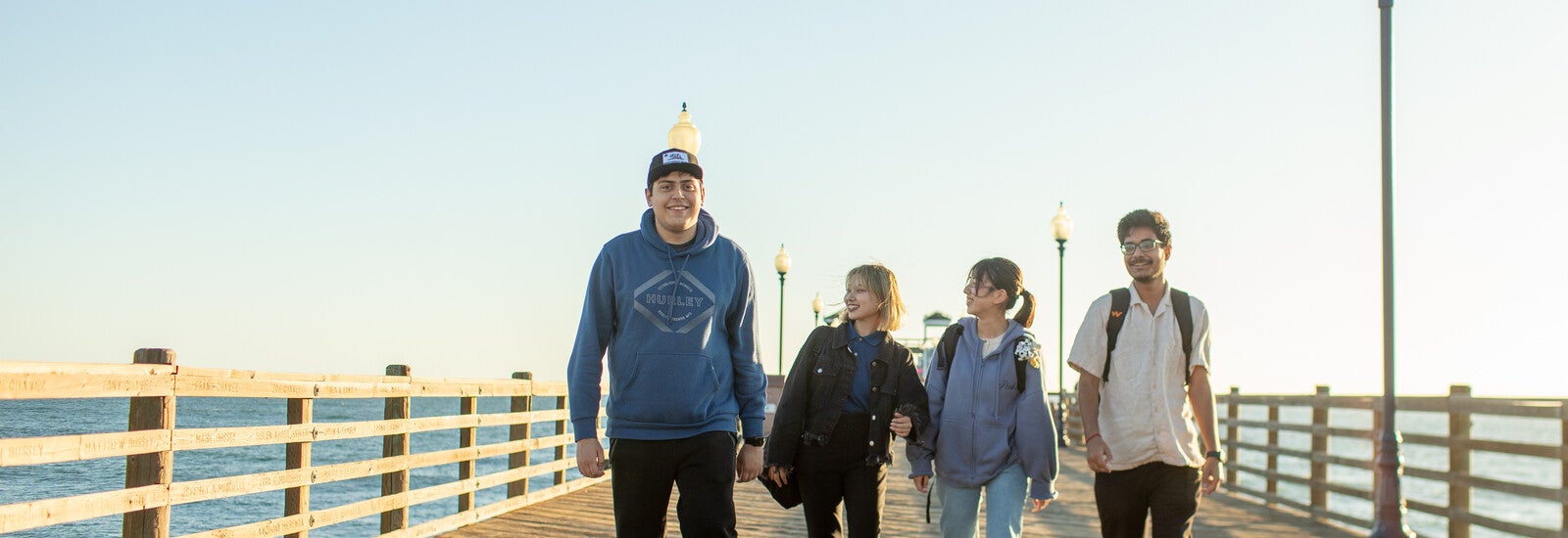CSUSM students walking along a pier
