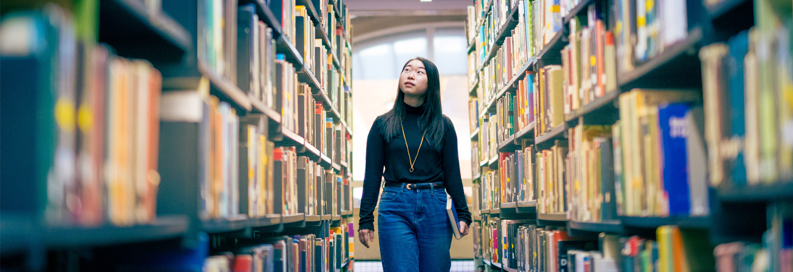 A Sussex ISC student in the library