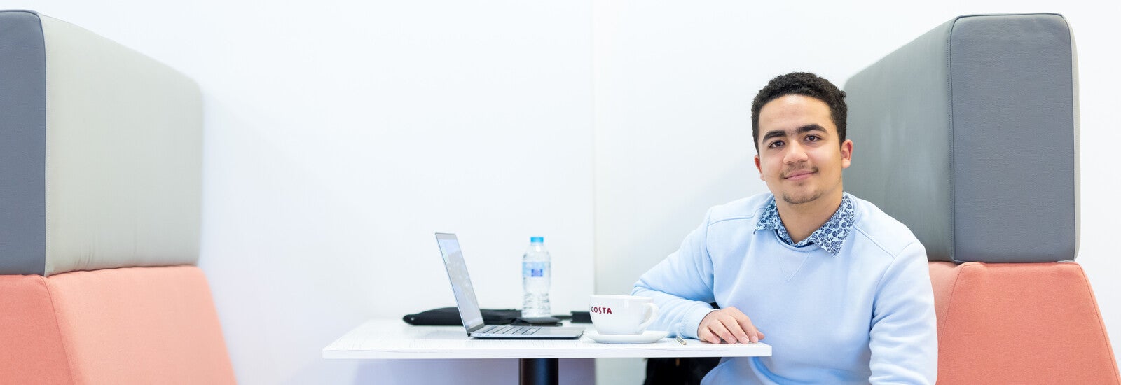 A student working in a common area