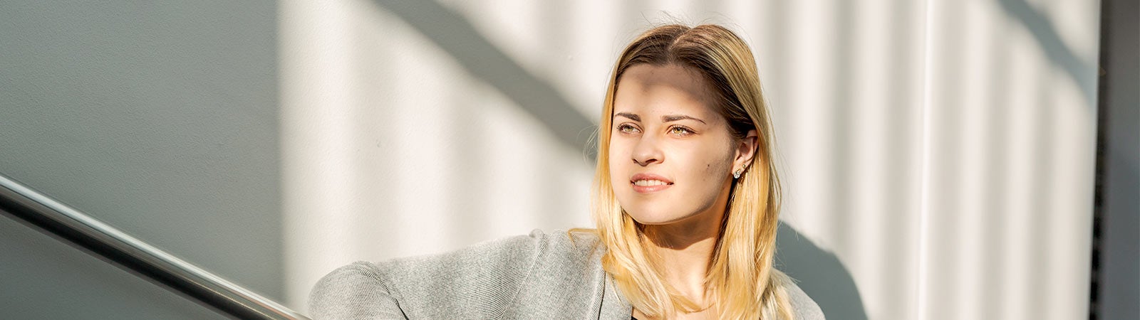 Student standing on stairwell
