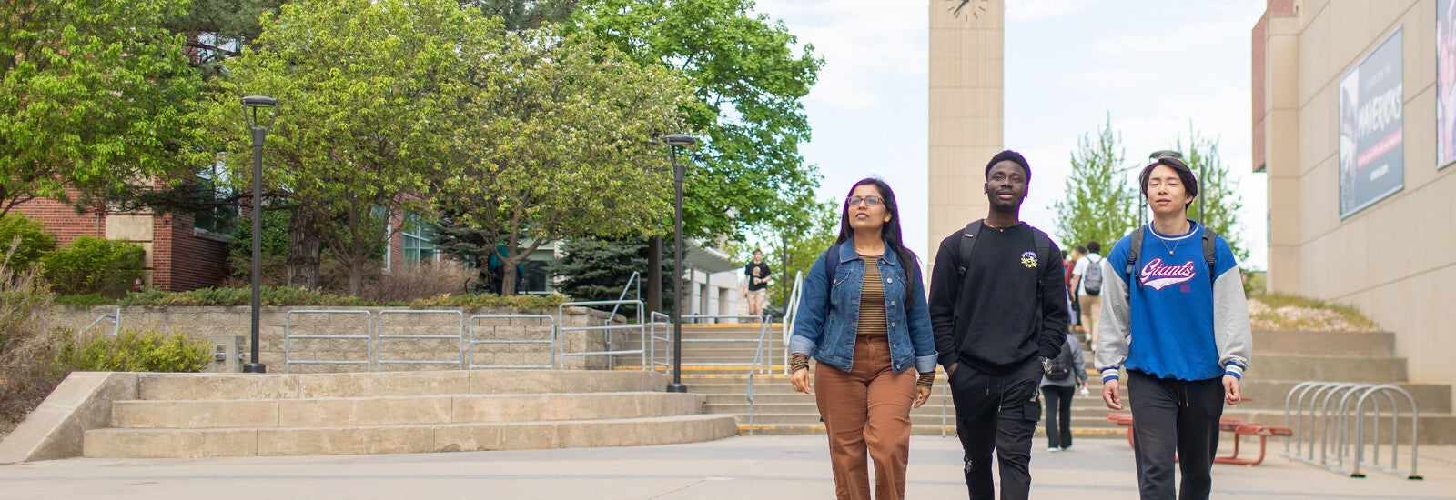 A group of students walking outside campus