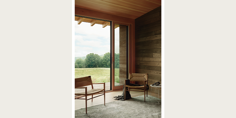 large expansive window and door with beautiful woodwork.