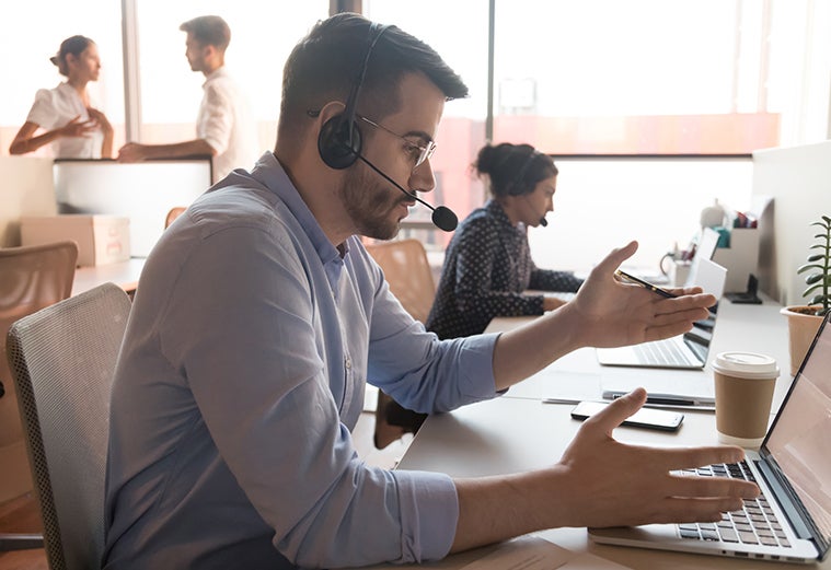 Man in call center talking