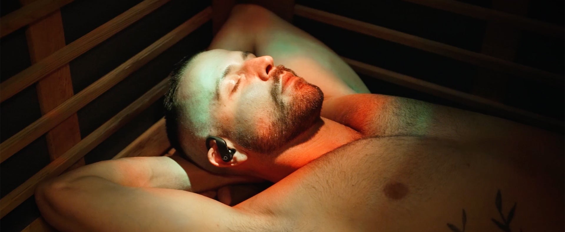 Man relaxing in sauna 
