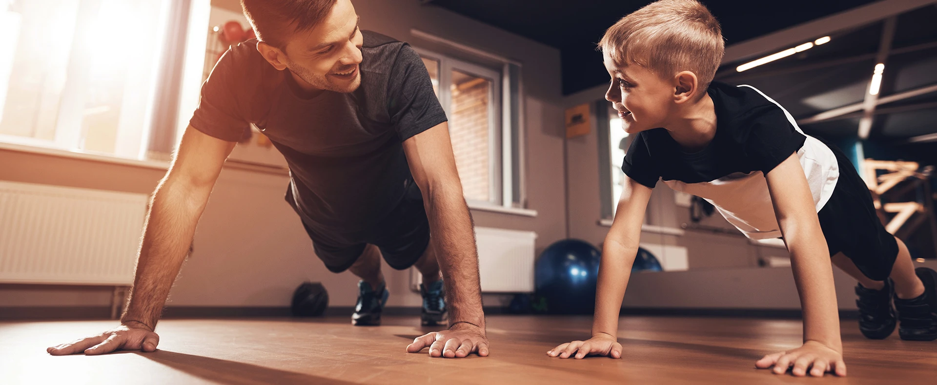 Duo doing push ups