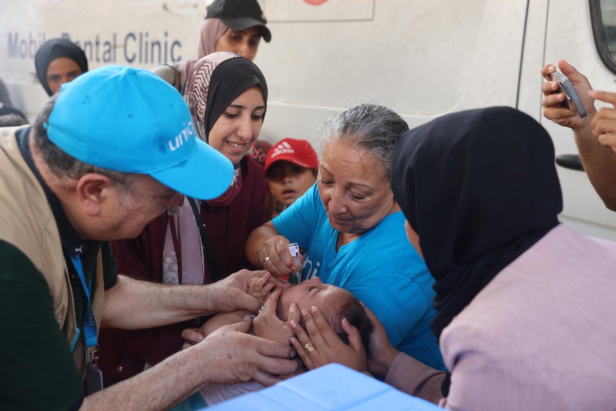 Children receive polio vaccines at UNRWA health clinic in the centre of the Gaza Strip.  